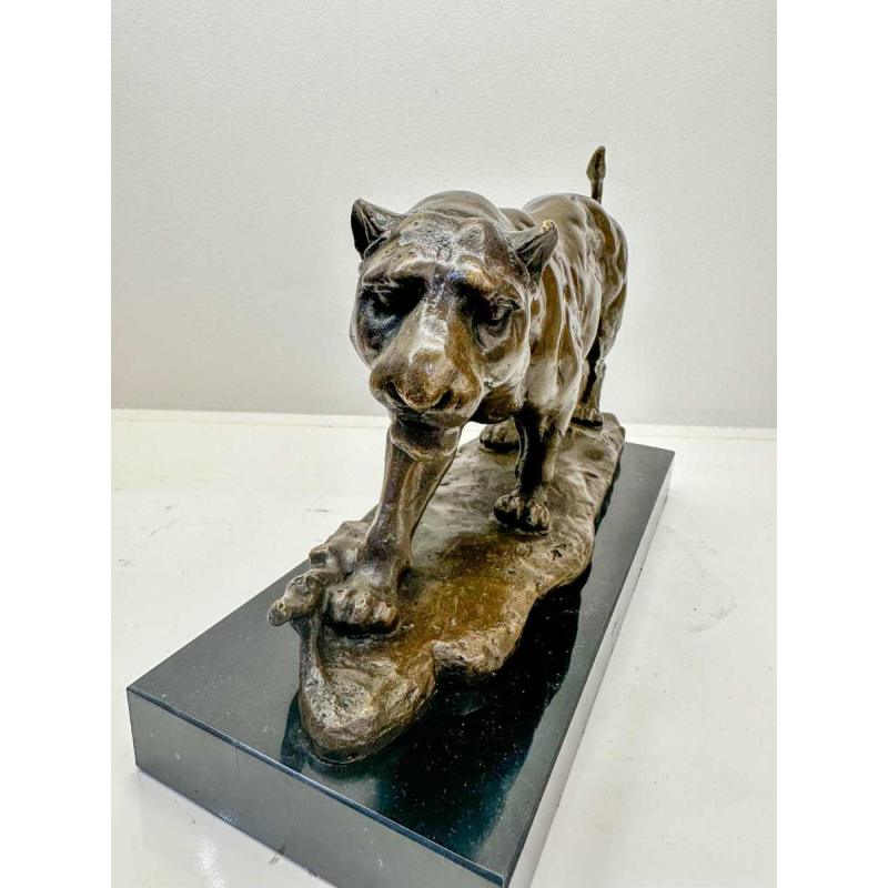 Sculpture of a lioness in bronze signed Barye (post-mortem casting)