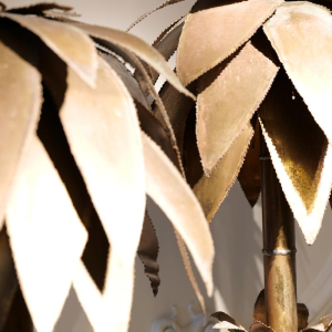 Jean Jansem, paire de lampes 'Palmiers' en métal patiné découpé, circa 1960-1970