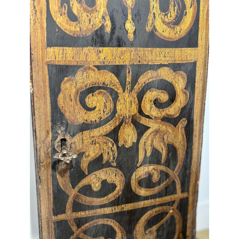 Column or small cabinet in black and gold painted wood, Italy, 19th century