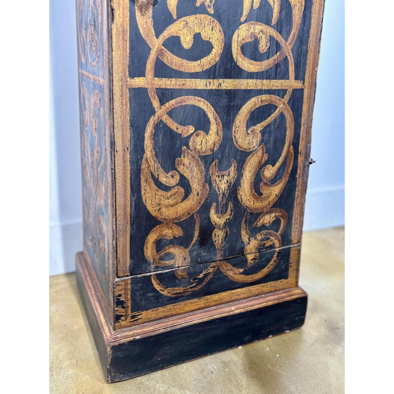 Column or small cabinet in black and gold painted wood, Italy, 19th century