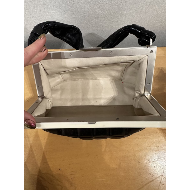 Chanel, black leather bag with bakelite clasp, circa 1920