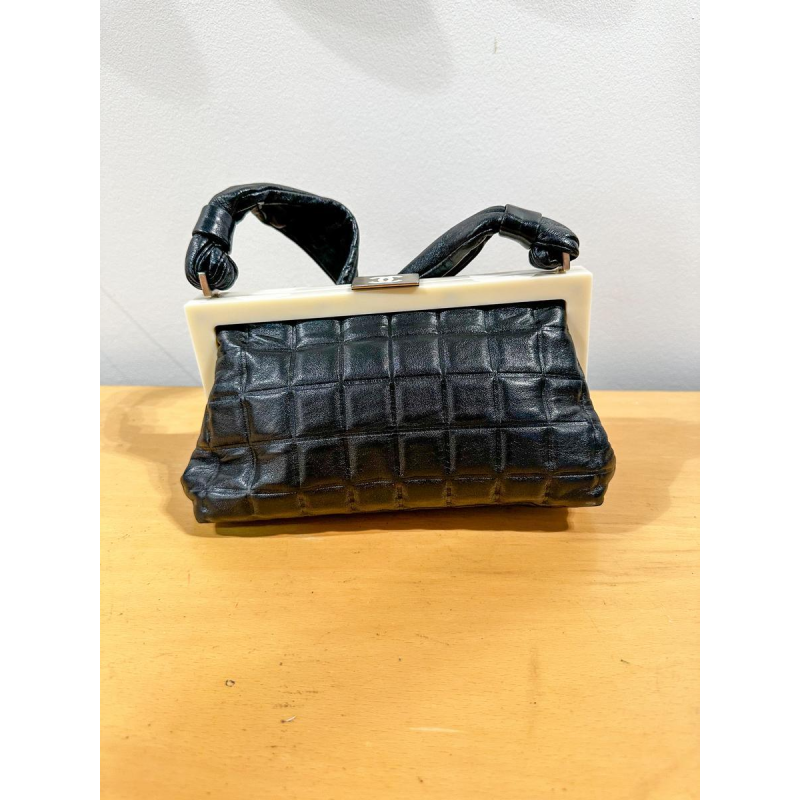 Chanel, black leather bag with bakelite clasp, circa 1920