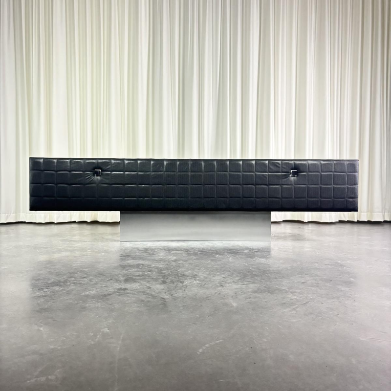 Modernist lowboard, imitation leather, wood and stainless steel, 1960