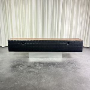 Modernist lowboard, imitation leather, wood and stainless steel, 1960