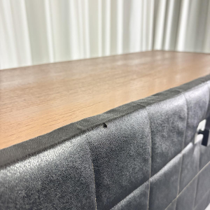 Modernist lowboard, imitation leather, wood and stainless steel, 1960