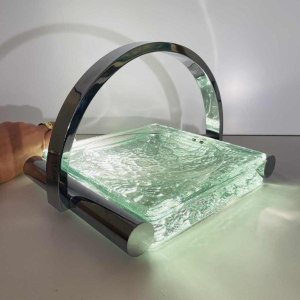 Jacques Adnet, vide poche Art Déco en acier chromé et verre épais texturé, XXe s