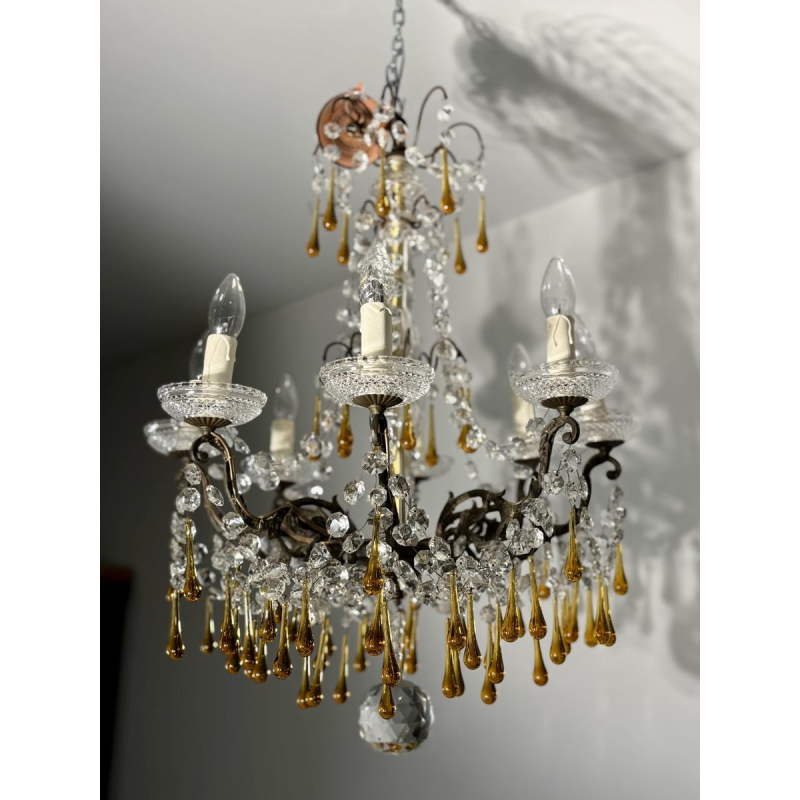 Eight-light chandelier with pendants, in bronze and crystal, amber glass drops, circa 1900