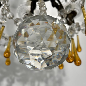 Eight-light chandelier with pendants, in bronze and crystal, amber glass drops, circa 1900