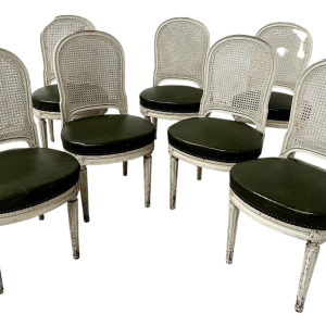 Set of seven Louis XVI style chairs in patinated beechwood, 20th century