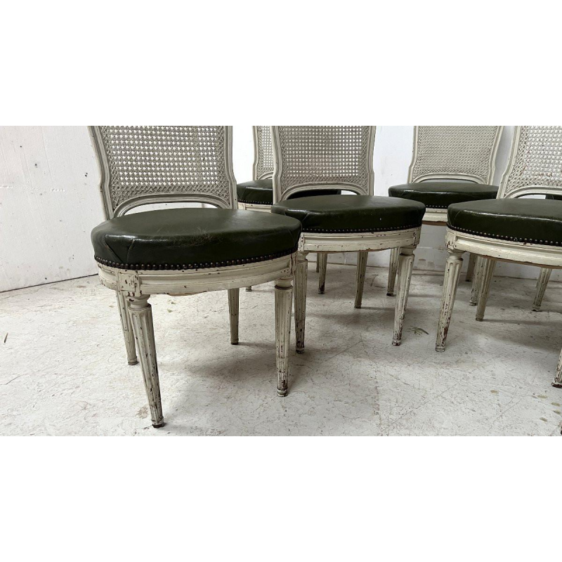 Set van zeven stoelen in Lodewijk XVI-stijl van gepatineerd beukenhout, 20e eeuw.