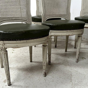Set of seven Louis XVI style chairs in patinated beechwood, 20th century