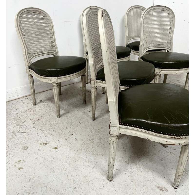 Set of seven Louis XVI style chairs in patinated beechwood, 20th century