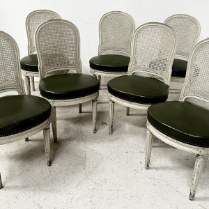 Set of seven Louis XVI style chairs in patinated beechwood, 20th century
