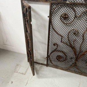 Hammered wrought iron gate, decorated with scrolls, flowers and foliage, 20th century