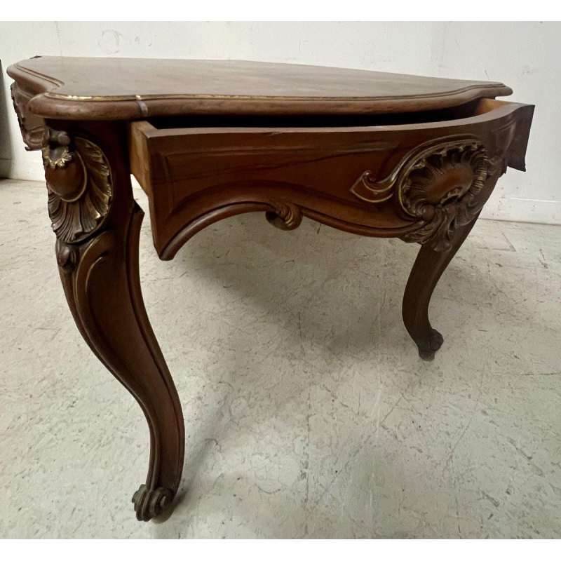Louis XV style desk in solid walnut with gold highlights, 19th century