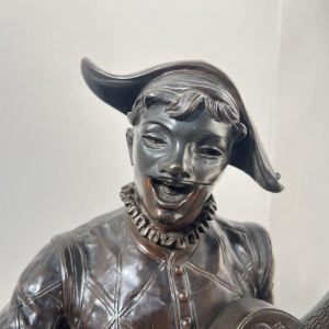 Marcel Debut " L'Arlequin Musicien " sculpture en bronze à patine brune, ca 1900