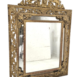 Louis XIV style closed-panel mirror in wood and gilt stucco, pediment with escutcheon and lions, 19th century