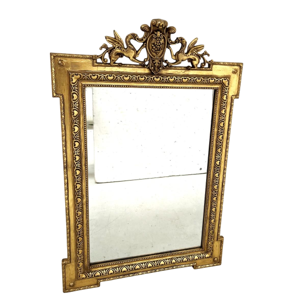 Miroir de style Louis XVI en bois et stuc doré, XIXe siècle