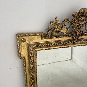 Miroir de style Louis XVI en bois et stuc doré, XIXe siècle