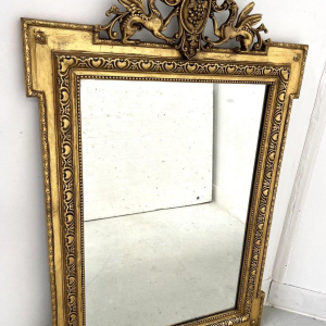 Miroir de style Louis XVI en bois et stuc doré, XIXe siècle