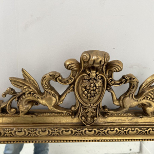 Louis XVI style mirror in wood and gilded stucco, 19th century