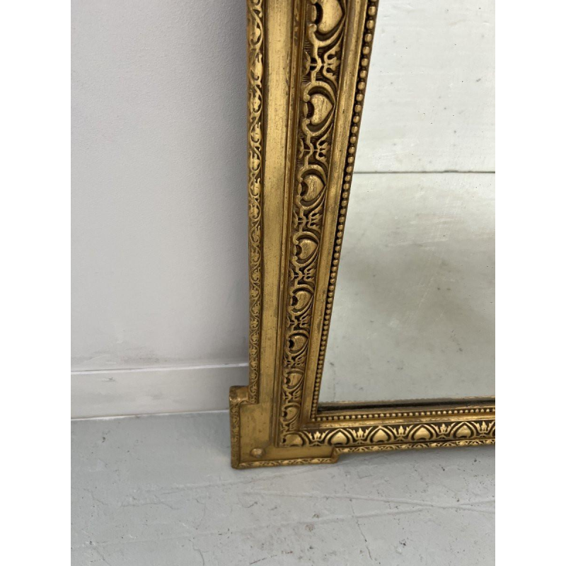Miroir de style Louis XVI en bois et stuc doré, XIXe siècle