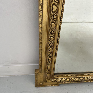 Louis XVI style mirror in wood and gilded stucco, 19th century