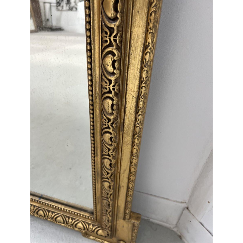 Louis XVI style mirror in wood and gilded stucco, 19th century