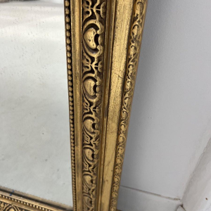 Louis XVI style mirror in wood and gilded stucco, 19th century