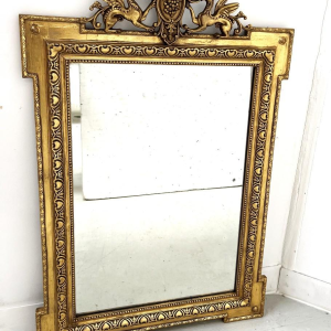 Miroir de style Louis XVI en bois et stuc doré, XIXe siècle