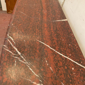 Pair of Louis XIV style fireplaces in griotte red marble, 19th century