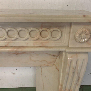 Louis XVI style fireplace in pink veined marble, 20th century