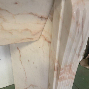 Louis XVI style fireplace in pink veined marble, 20th century