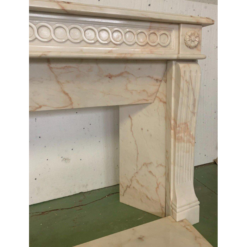 Louis XVI style fireplace in pink veined marble, 20th century