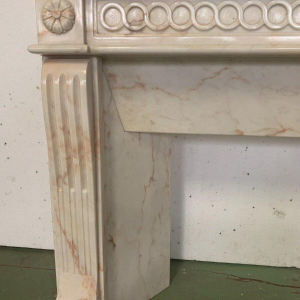 Louis XVI style fireplace in pink veined marble, 20th century
