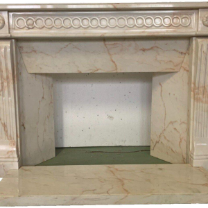 Louis XVI style fireplace in pink veined marble, 20th century