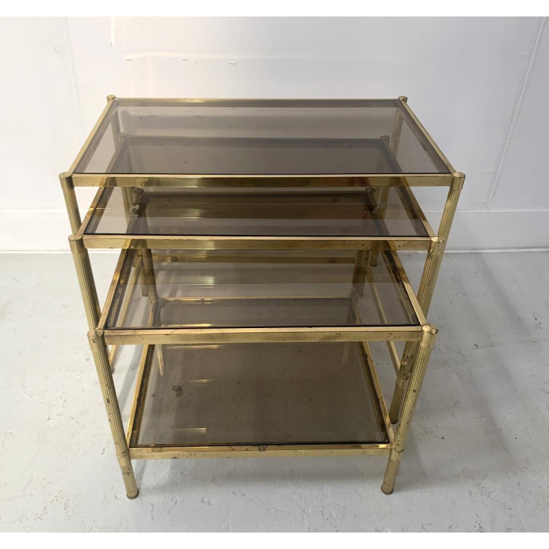 Set of three vintage nesting tables in brass and smoked glass, 20th century