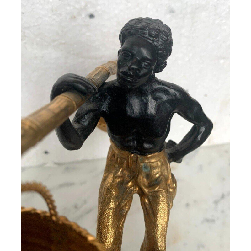 Bronze sculpture with a double patina, "African Man Carrying a Basket Balancing Act," 20th century