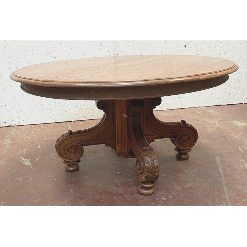 Grande table Napoléon III à allonges, piètement central en noyer massif, XIX siècle
