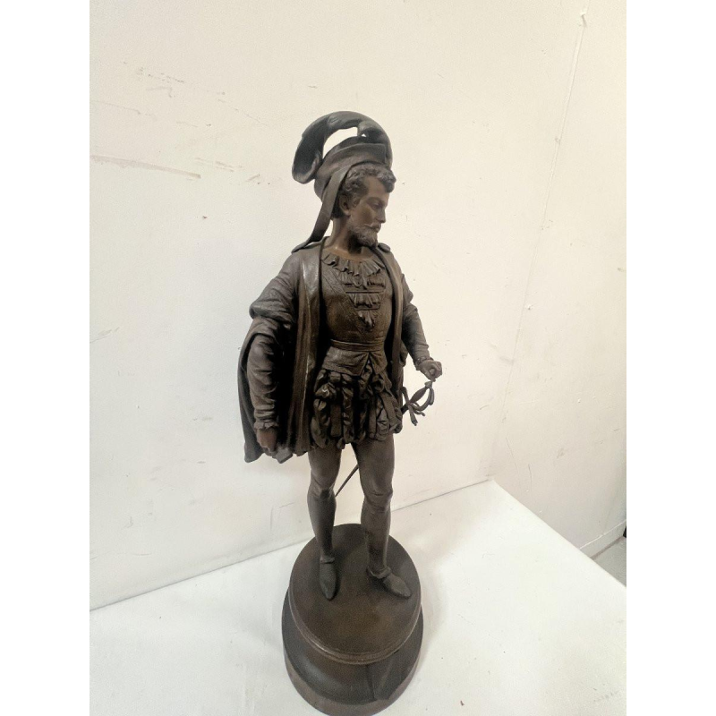 G. PILON "Jongeman met zwaard", gepatineerd zinken beeldhouwwerk, 20e eeuw