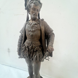 G. PILON "Jongeman met zwaard", gepatineerd zinken beeldhouwwerk, 20e eeuw