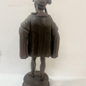 G. PILON "Jongeman met zwaard", gepatineerd zinken beeldhouwwerk, 20e eeuw