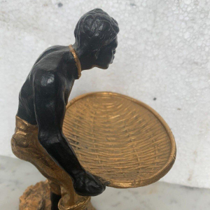 "The Man with the Woven Basket," bronze sculpture with a double patina, 20th century