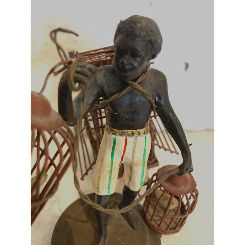 "The Birdcage Carrier," miniature bronze sculpture, 20th century