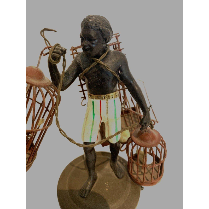 "De vogelkooidrager," miniatuur bronzen sculptuur, 20e eeuw