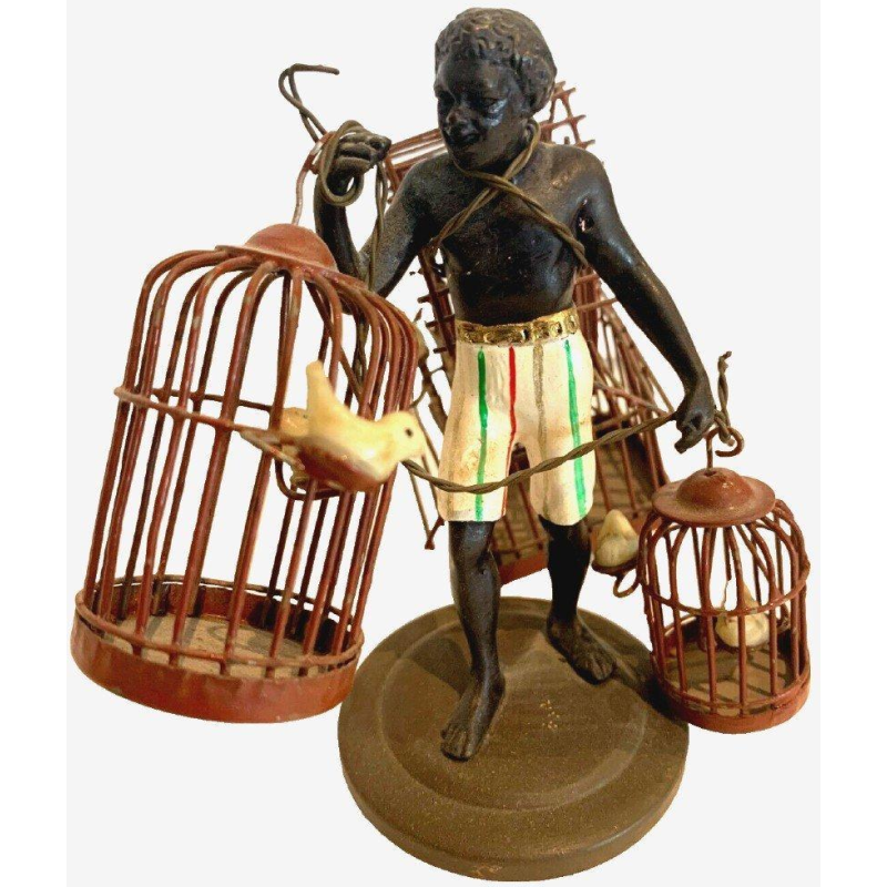"De vogelkooidrager," miniatuur bronzen sculptuur, 20e eeuw