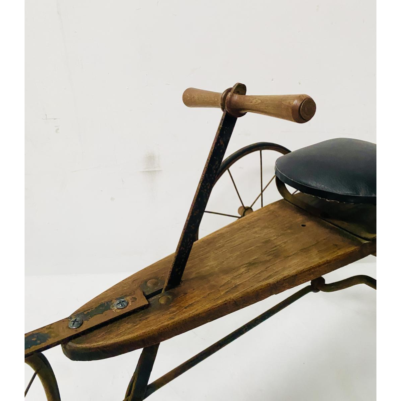 A child's toy bicycle, also known as a draisine – late 19th century