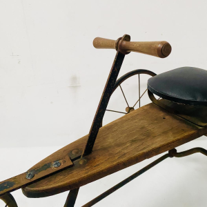 A child's toy bicycle, also known as a draisine – late 19th century