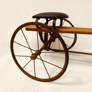 A child's toy bicycle, also known as a draisine – late 19th century