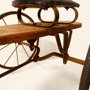 A child's toy bicycle, also known as a draisine – late 19th century
